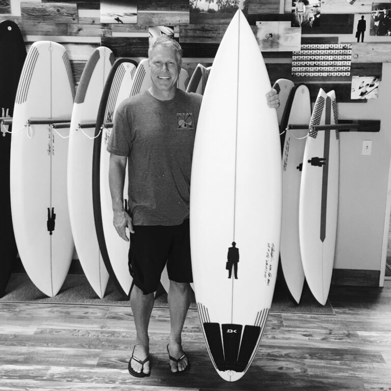 brian with his custom ante-up step-up surfboard