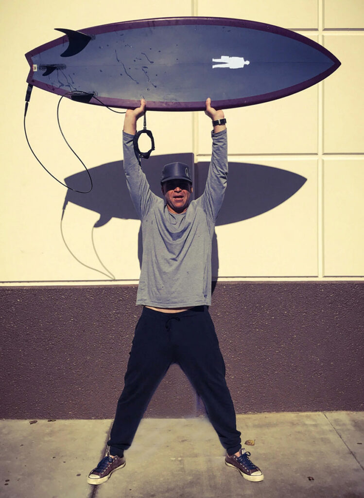 erik with his performance twin surfboard